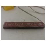 Two Lamps And Fresh Farm Cheese Sign