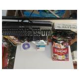 Keyboard, CD Cases, Howard Stern Book, A ticket