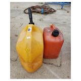 (2) Gas Cans - (1) 5 gallon And (1) 2.5gallon