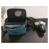 Minolta STsi Camera With Case, Film Canisters,