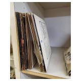 An Assortment Of Records With Artist Like Johnny