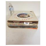 An Assortment Of Records With Artist Such As