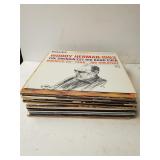 An Assortment Of Records With Artist Such As