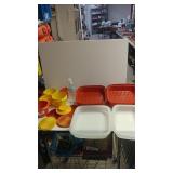 An Assortment Of Food Storage Containers And Lids