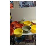 An Assortment of Food Storage Containers And Lids