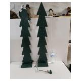 Two Wooden Trees With Lights