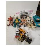 Assorted Action Figures,  Model Car & More