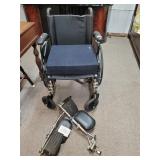 Wheelchair With Cushion And Unattached Foot Rests