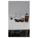 Fisherman On A Boat Statue, Fishing Mug, And Jaws