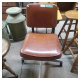 Burnt Orange Rolling Chair