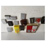 Assorted Lighters With Some Fluid