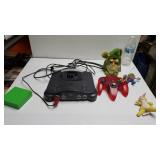 Nintendo 64 And Controller With Game, Furby, And