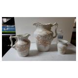 Set Of Floral Decorated Pitchers And Vase