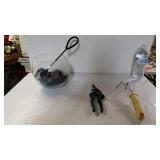 Fish Bowl With Food And Net And Gardening Tools