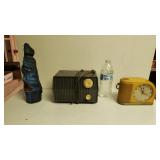 Alarm Clock, Radio, And Wooden Statue