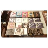 Assorted CD Albums And DVDs