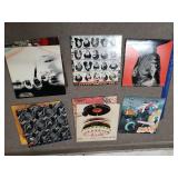 Assorted Rolling Stones Albums,  Keychains, John