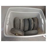 Assorted Tires In Storage Tote
