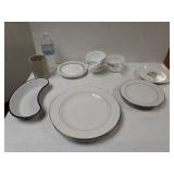 Assorted Plates, Cups, And Dishes