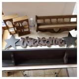 Wooden Shelves And Welcome Wooden Sign