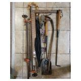 Assorted Tools And Umbrella
