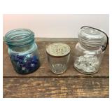 Marbles with shooters, prisms, and vintage jelly