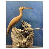 Carving on driftwood signed C.W. Pippin