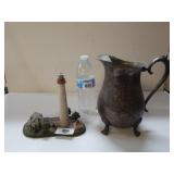 Silver Like Pitcher And Lighthouse