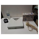 Scale, Clock, Extension Cord And Wrinkles Away