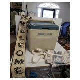 Welcome Wall Display,  Coleman Cooler & Bags