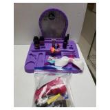 Young Girls Play Makeup Display