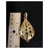 Gold Tone Pendant. No Markings