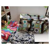 Shopping Bags And A Vera Bradley Bag