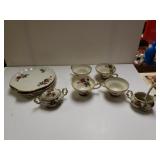 Tea Cups And Plates With Cream And Sugar Bowls