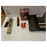 Staplers Flashlight Rolex And Cassette Tapes