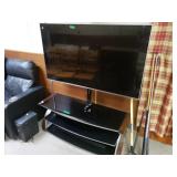 Flat Screen TV And Stand. 65" LG
