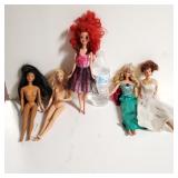 5 Barbie Dolls