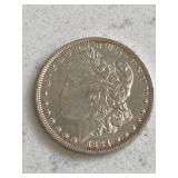 1884 O Morgan Silver Dollar AU Toned