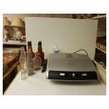 George Foreman Grill And Vintage Bottles