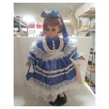 Blue Dressed Porcelain Doll