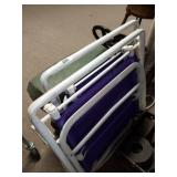 2 Purple Folding Chairs