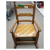 Small Brown Wooven Seat Rocking Chair