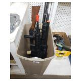 Trash Can With Assorted Toy Rifles