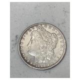 1885 AU Morgan Silver Dollar