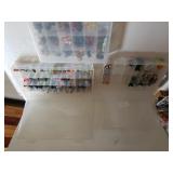 Assorted Figures In Containers Possibly For