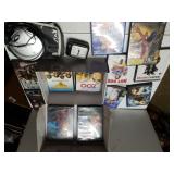 Assorted DVDs, Clock, Compact Disc Player
