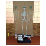 3 Plastic Hanging Skeletons and Animated Vampire