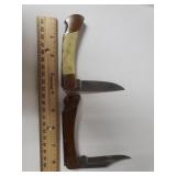 (2) Folding Pocket Knives - (1) Sabre
