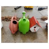 Watering Cans And Birdhouse