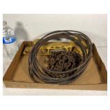 Copper tubing, chain, block sander